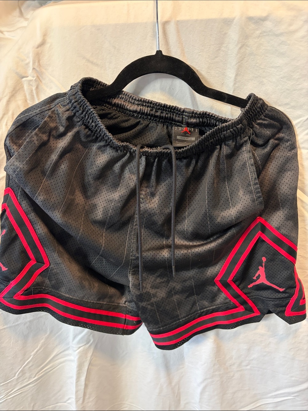 Jordan Women’s Black Athletic Shorts with Pink Trim